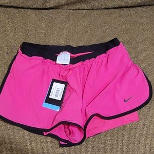Nike NWT dri fit running shorts, sz M pink w/black trim